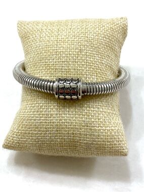 Polished Silver-Tone Coil Bracelet with Decorative Clasp